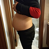 肚子一天天的长大了