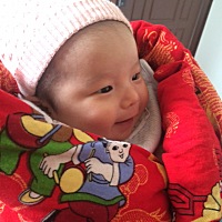 两个月的琪宝，是个爱笑的姑娘
