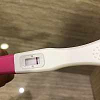 5.3排卵，同房今天第七天，早上就很隐约的看到意念灰。但拍照看不出。下午七点又测了一下，拍照可以看出...