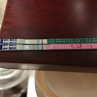 排卵日后12天分别用早孕试纸和排卵试纸测的，能看出来吗，请教各位孕妈们^