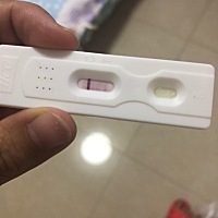 请问是否是怀孕！！本人带了节育环，已有一孩。最近感觉恶心，犯困打不起精神。验孕后发现是这样。