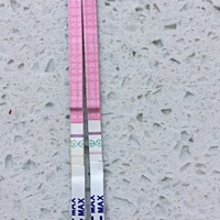 麻烦问下亲们 还有两天来例假 测早孕白板 排卵试纸越来越强 这是昨天和今天的 有可能是怀孕了吗