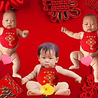 翻到儿子百天照和爸爸的半岁照