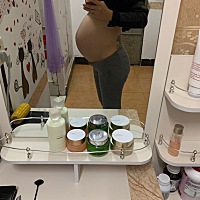 看肚子形、猜男女