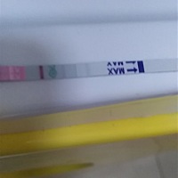 这个如果是怀孕试条多好，还有一个星期就该月经期了，怀孕试条白板，排卵试条可以看见一点点