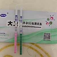 末次月经6.10开始，6.15干净 今天晚上刚测的 红色是用的排卵试纸 绿色用的是早早孕试纸 是不是怀孕了