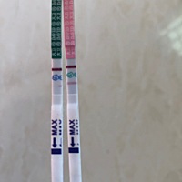 这是什么情况。粉色排卵试纸，绿色早孕试纸。 这是什么情况，粉色排卵试纸，绿色早孕试纸