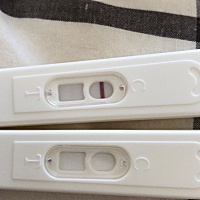 能不能帮我看一下，是不是怀孕了？ 刚刚测试的，颜色特别暗