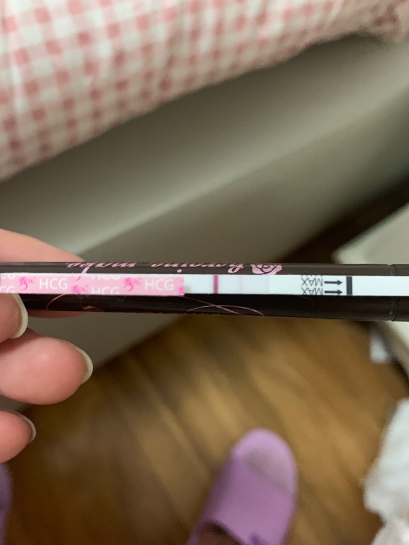 排卵期同房后的12天，我肉眼看的比照片清楚，这是怀孕了吗？最近腰疼，小腹也怪样子，我还没去查血，姐妹们，你们看看有没有可能是怀孕，这是zh