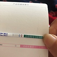 排卵第七天 忍不住测了一下 刚开始什么都看不到 突然好像看到一条印  老公说我是心理作用  可能真的是吧