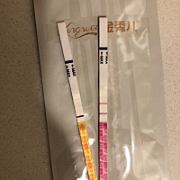 一直测白板，左边是今天刚验的，请问是中了吗？