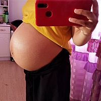 图一是怀老大的时候，图二是怀老二，不知道老二是男女😂